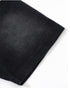 Detailed view of T-shirt sleeve showing rotator cuff seam and clean stitching.