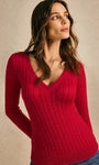 red v-neck christmas sweater on model front view