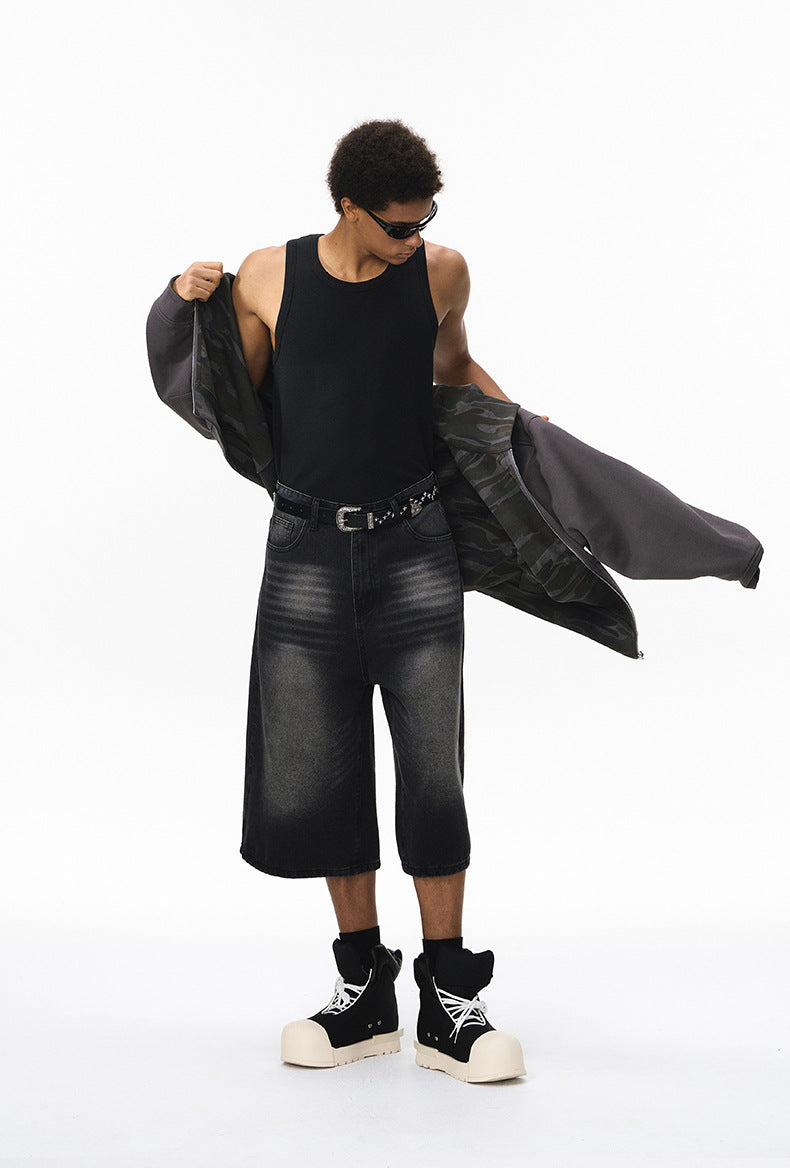 Reversible hoodie switching sides—inner camo shown mid-change