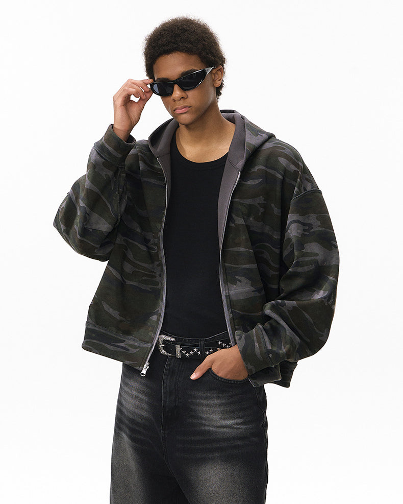 Reversible hoodie, dark gray side—three-quarter view with hood down