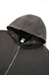 Reversible hoodie detail—hood and zipper close-up, clean edges both sides