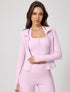 Model in lilac ribbed yoga jacket and matching pants