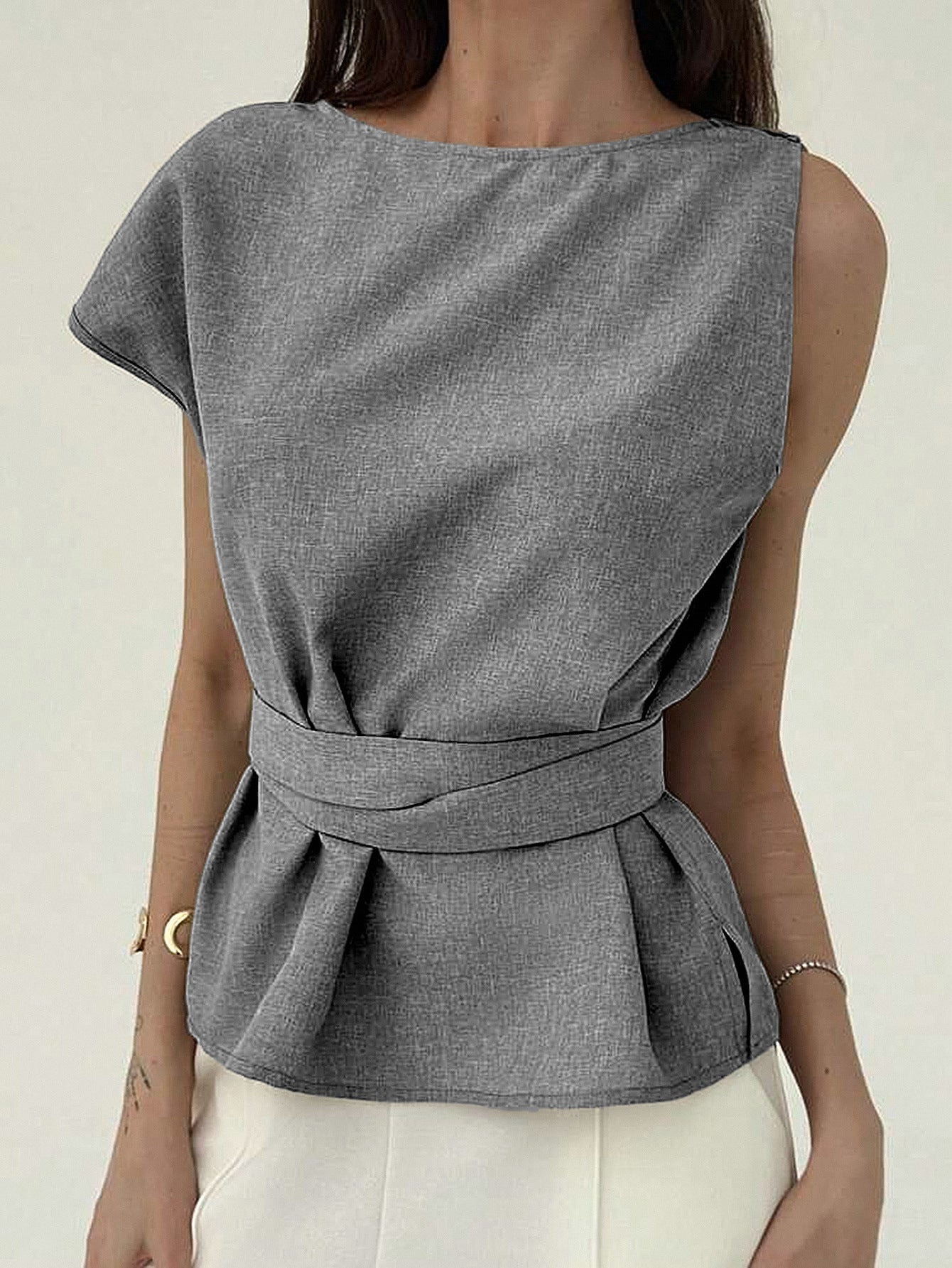 Close-up of round neck and fabric texture on gray office top