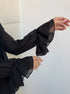 Sheer black blouse sleeves with double-layer ruffle cuffs