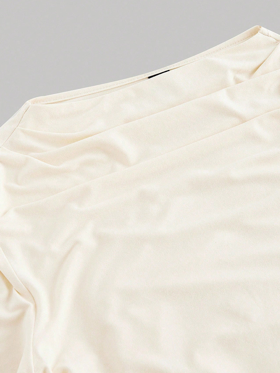 neckline detail of shirt long sleeve tshirts, almond crew neck, soft drape, ruched bodice edge