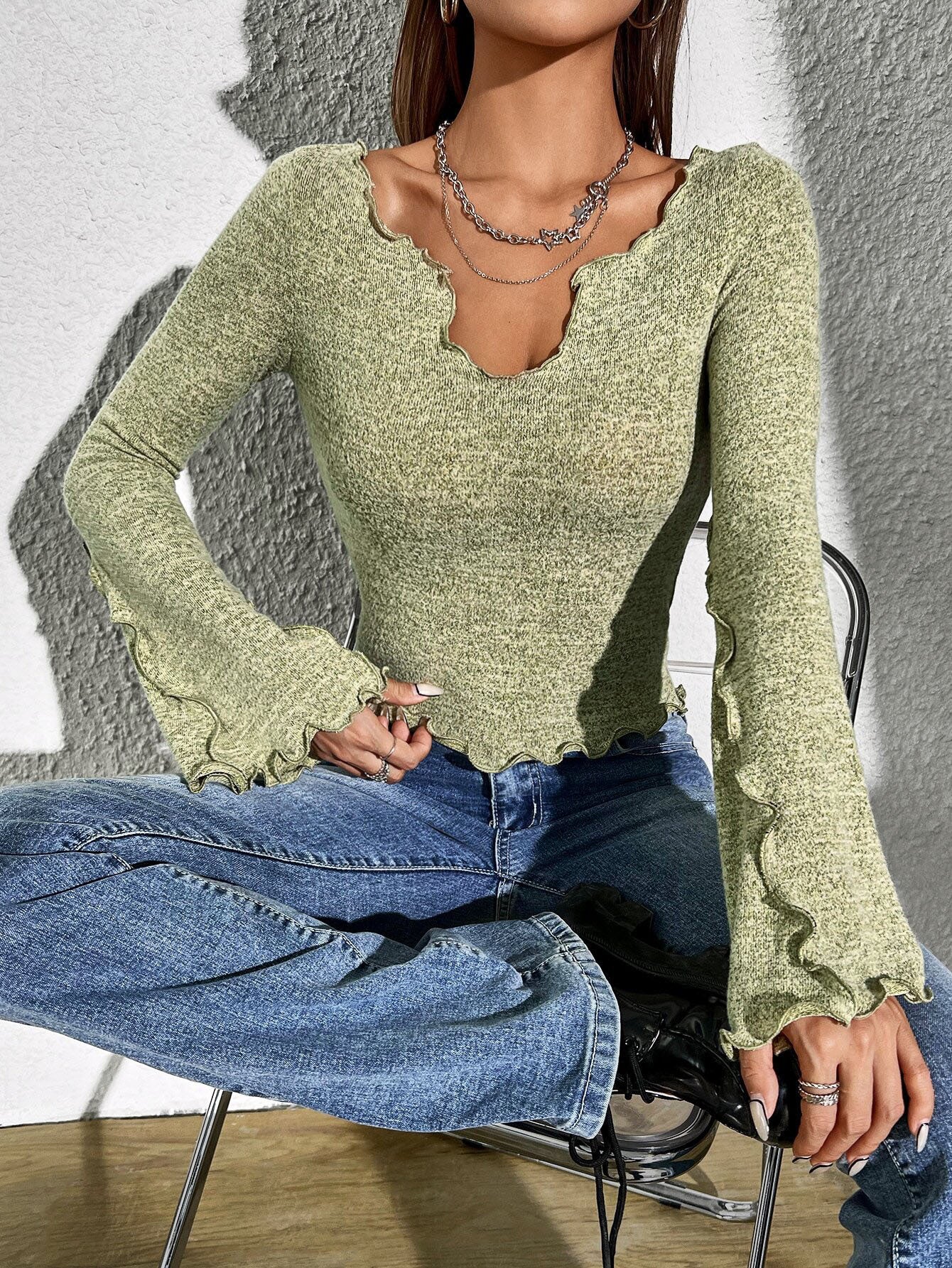 grass green shirt-style long sleeve T-shirt, slim fit with bell sleeves, front seated view