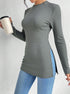 full front pose, slim fit ribbed long sleeve tee, shirt-style crew neck, pronounced side slit