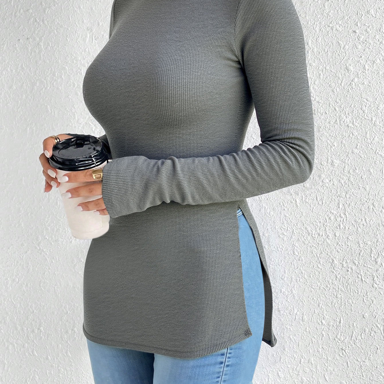 shirt-style long sleeve T-shirt, slim fit ribbed knit with side slit, crew neck, front view holding cup