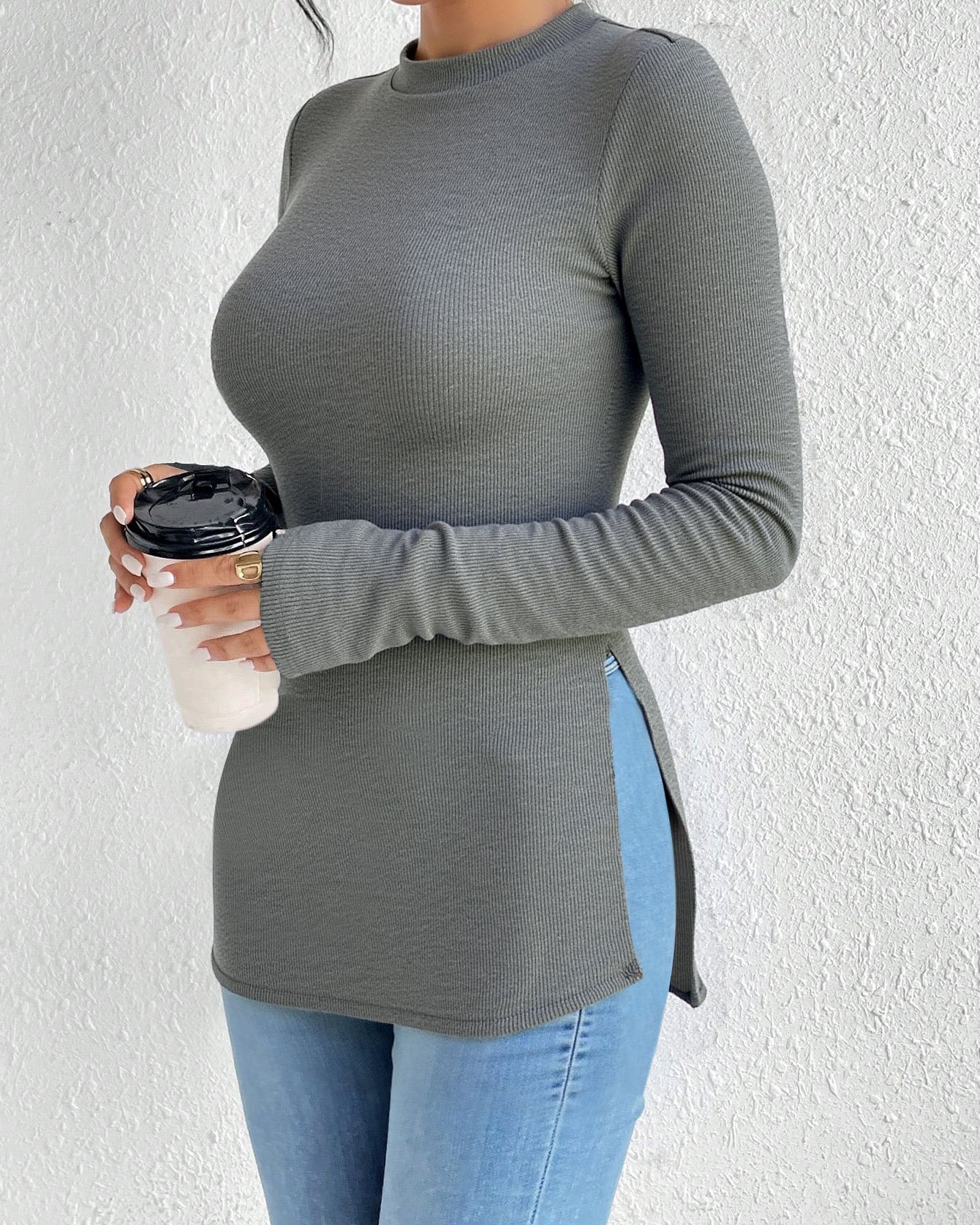 shirt-style long sleeve T-shirt, slim fit ribbed knit with side slit, crew neck, front view holding cup