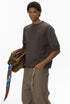 Back view of brown short sleeve knit top with ribbed hem
