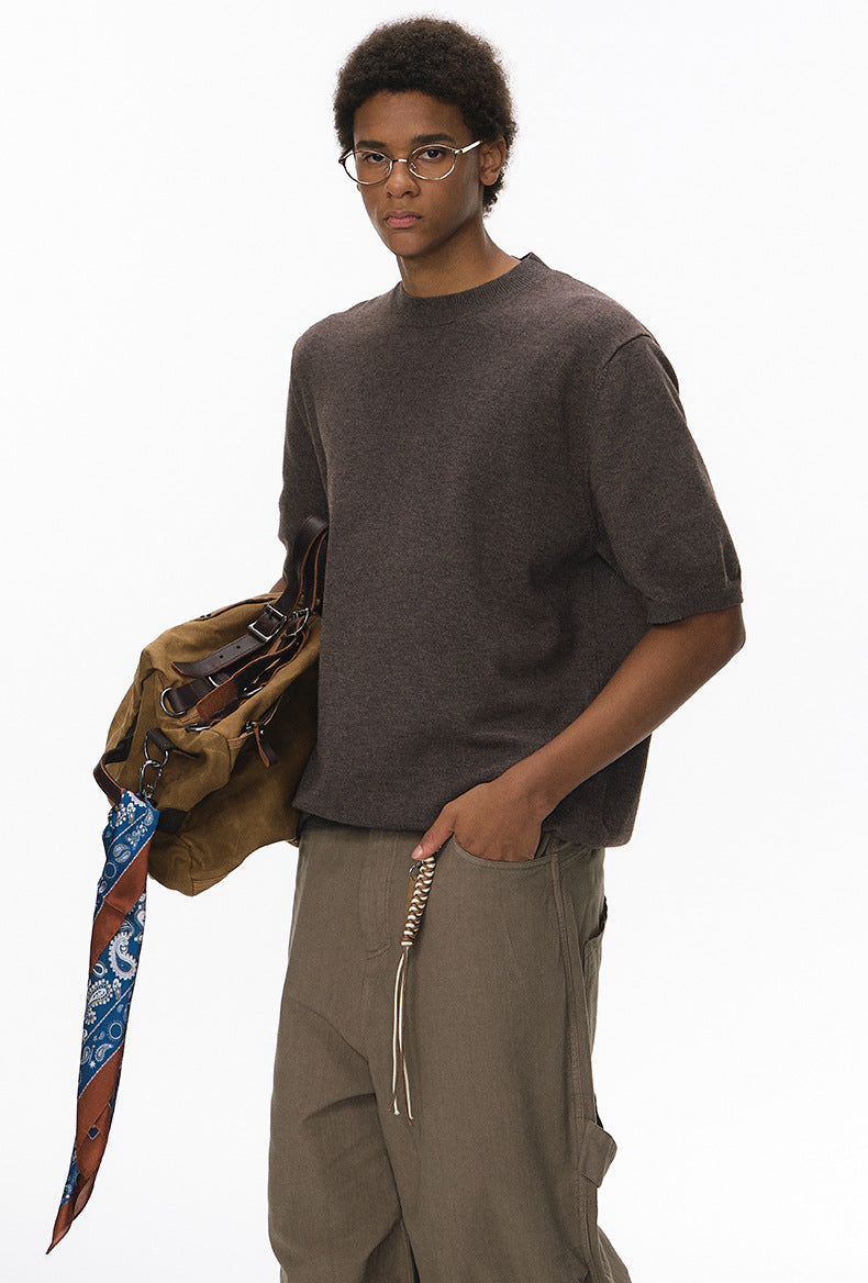 Back view of brown short sleeve knit top with ribbed hem
