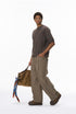 Casual short sleeve knit top in brown styled with wide pants