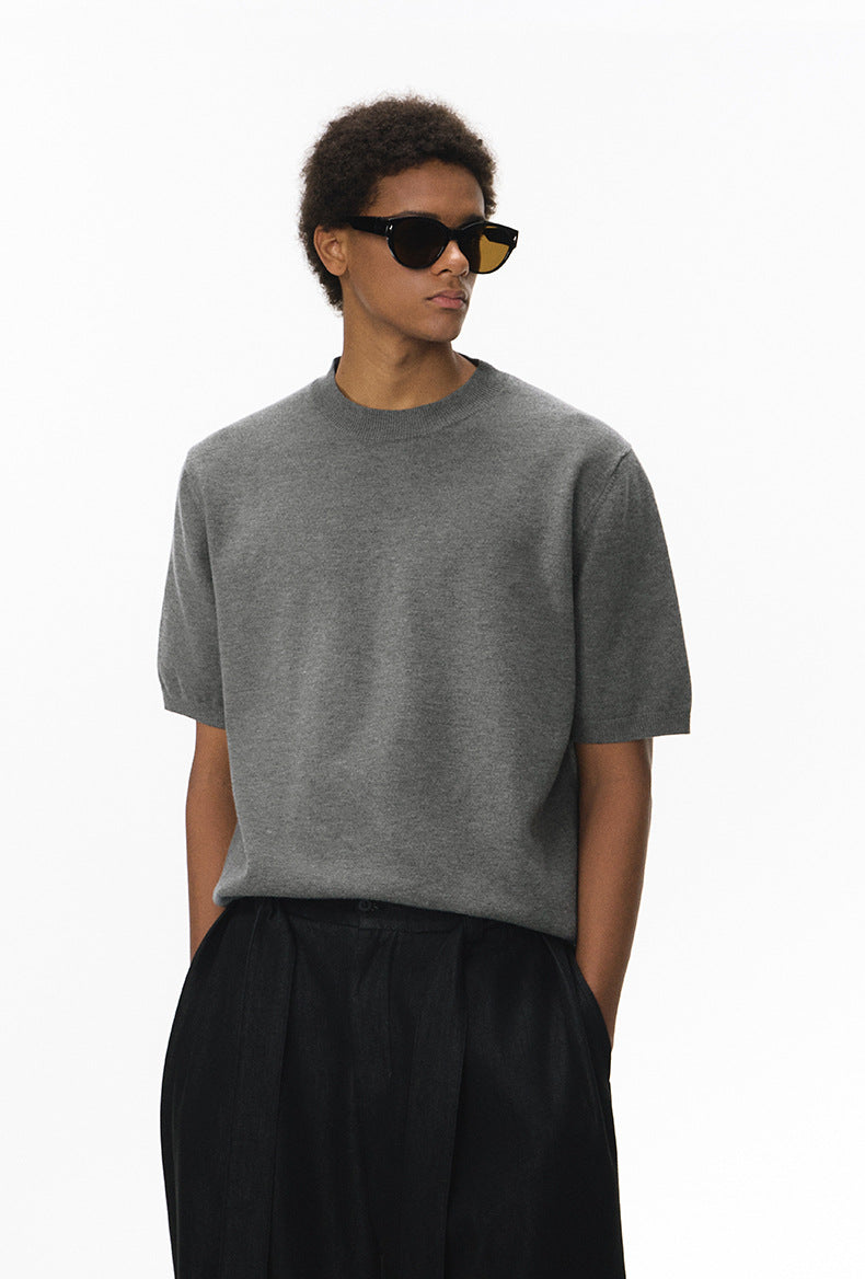Gray short sleeve knit top front view with sunglasses