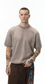 Khaki short sleeve knit top front view on model