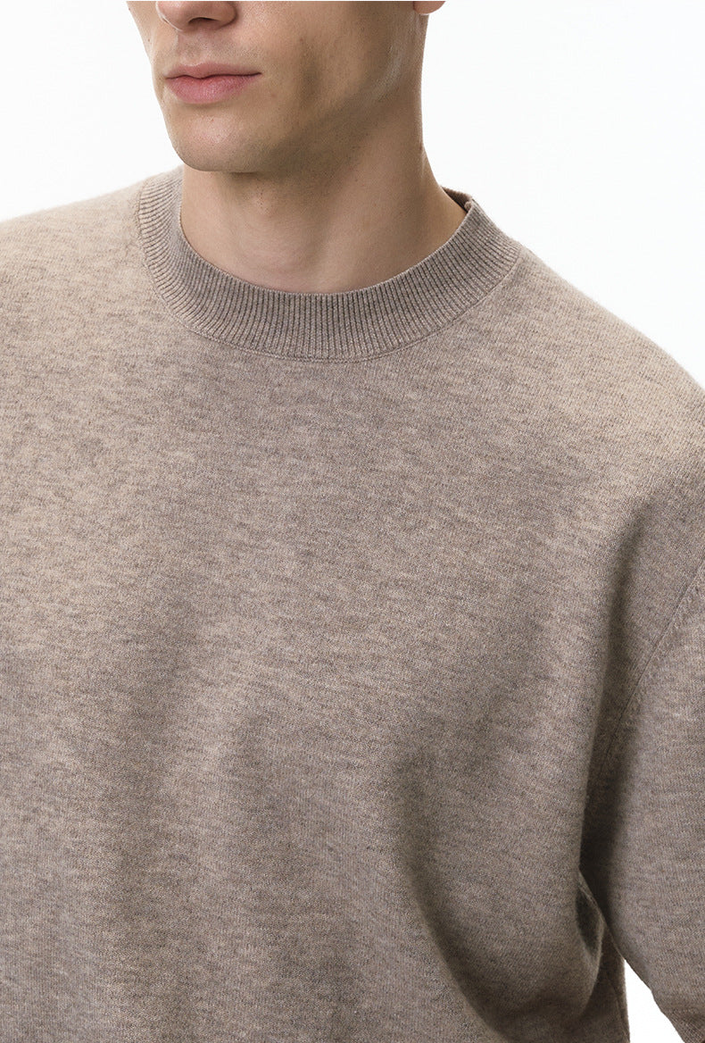 Close-up of khaki short sleeve knit top crew neckline