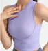 Close-up of lavender ribbed tank top highlighting seam lines and fit.