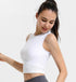 White ribbed athletic tank top shown from side with clean seam finish.