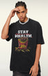 Close-up of black graphic T-shirt with bullets in fry container and 'Stay Health.' text