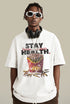Close-up of white graphic T-shirt with bullets in fry container and 'Stay Health.' text.