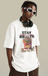 Model in black T-shirt with bullet fries design, showing side view.
