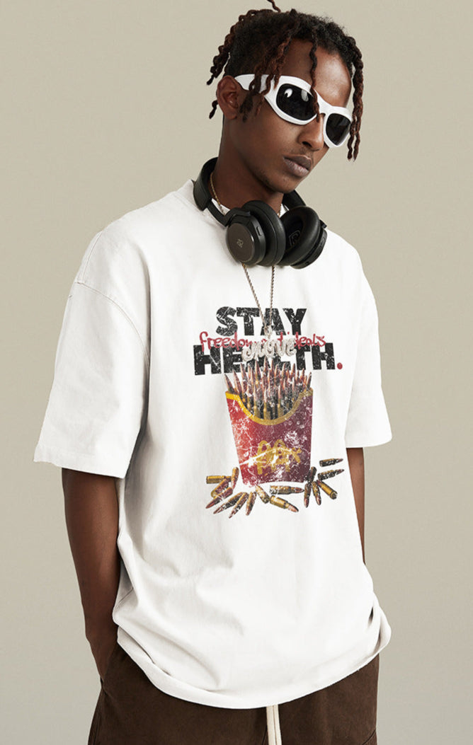 Model in black T-shirt with bullet fries design, showing side view.