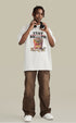 Model wearing white graphic T-shirt with bullet fries artwork and satirical text.
