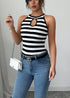 Full view of striped sleeveless tank top with jeans and white bag