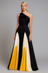 Woman wearing a one-shoulder maxi dress  with black, white, and yellow color block design on a gray background.