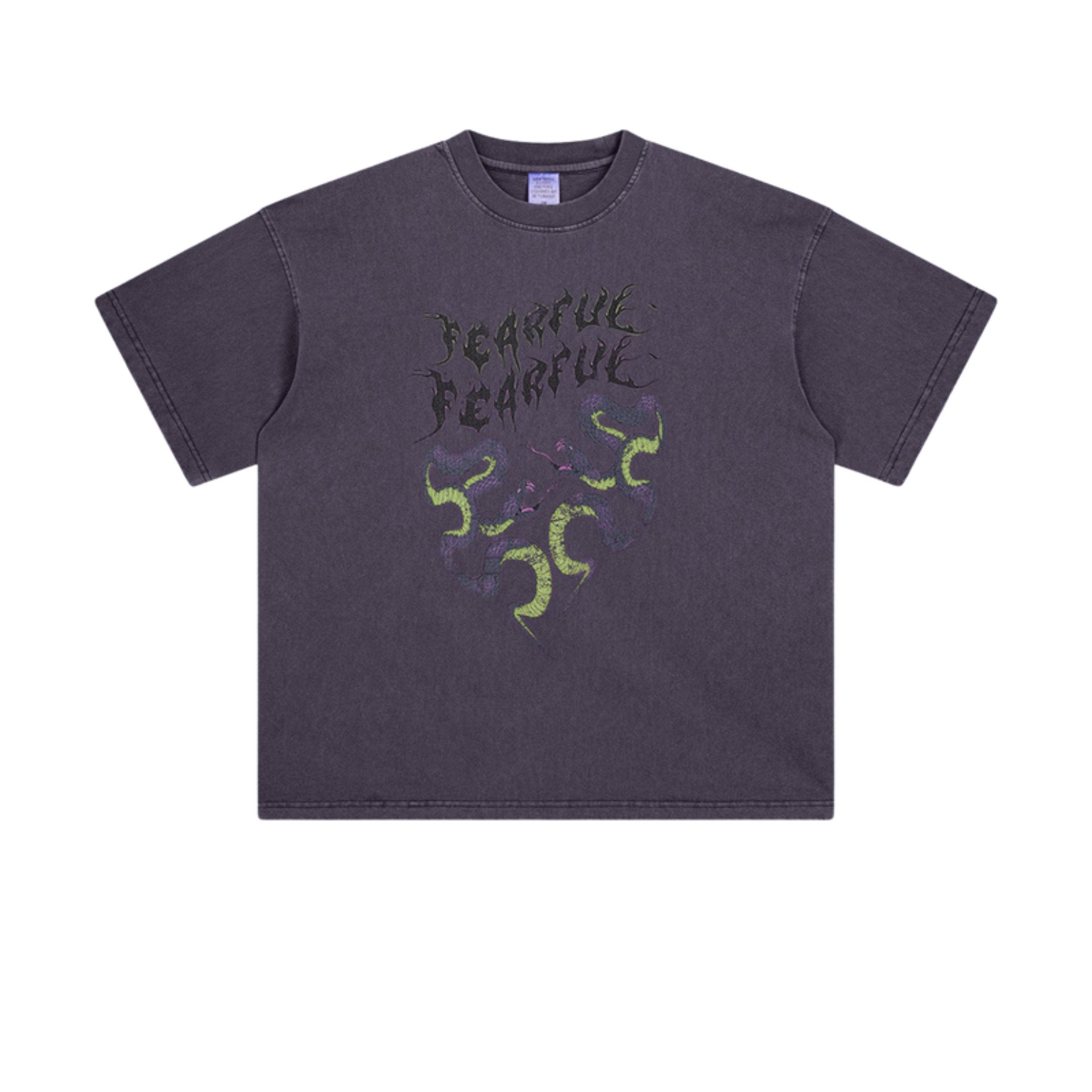 Men’s oversized purple tee with green snake-heart design and “Terrible Beauty” gothic text