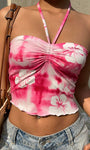 Front view of pink floral tie dye halter top with ruched front detail