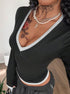 angled close view V neck long sleeve top, black with grey trim, slim fit waist