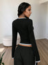 back view black V neck long sleeve top, slim fit knit, contrast hem