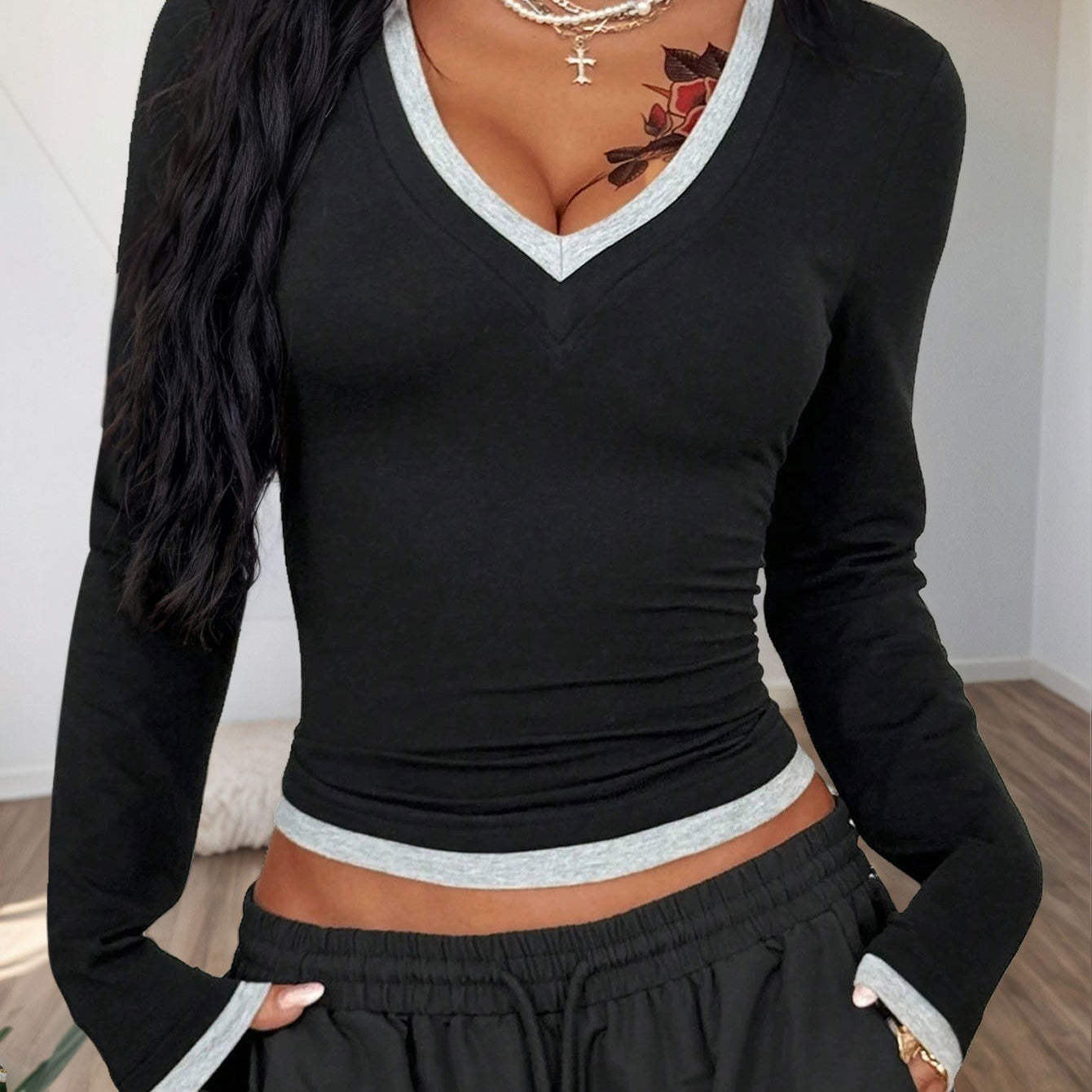 black V neck long sleeve top with contrast grey trim, slim fit, front close view