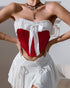 Front view of red strapless corset with bold white bow and gathered trim, styled for a festive look.
