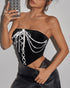 Mirror selfie showing glitzy detail of black velvet bustier.