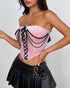 Side angle of pink bustier showing pearl chains and black lacing.