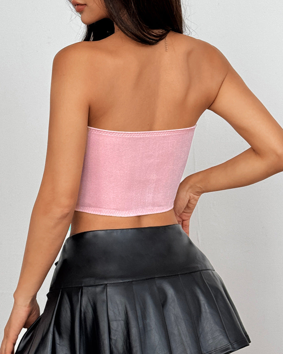Rear view of plain pink velvet back panel on strapless corset.