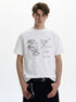 White birdcage and rose graphic T-shirt shown from the front