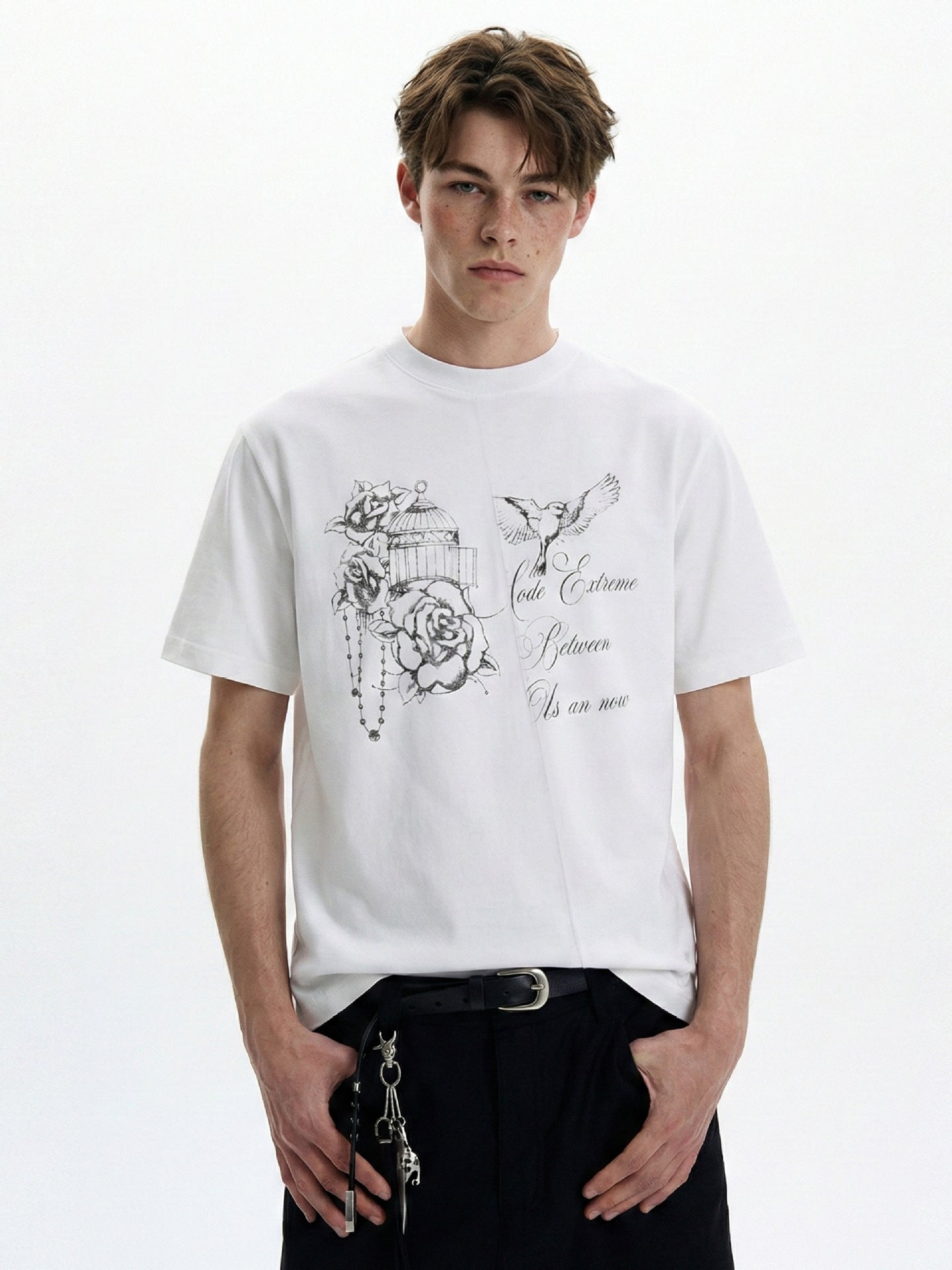 White birdcage and rose graphic T-shirt shown from the front