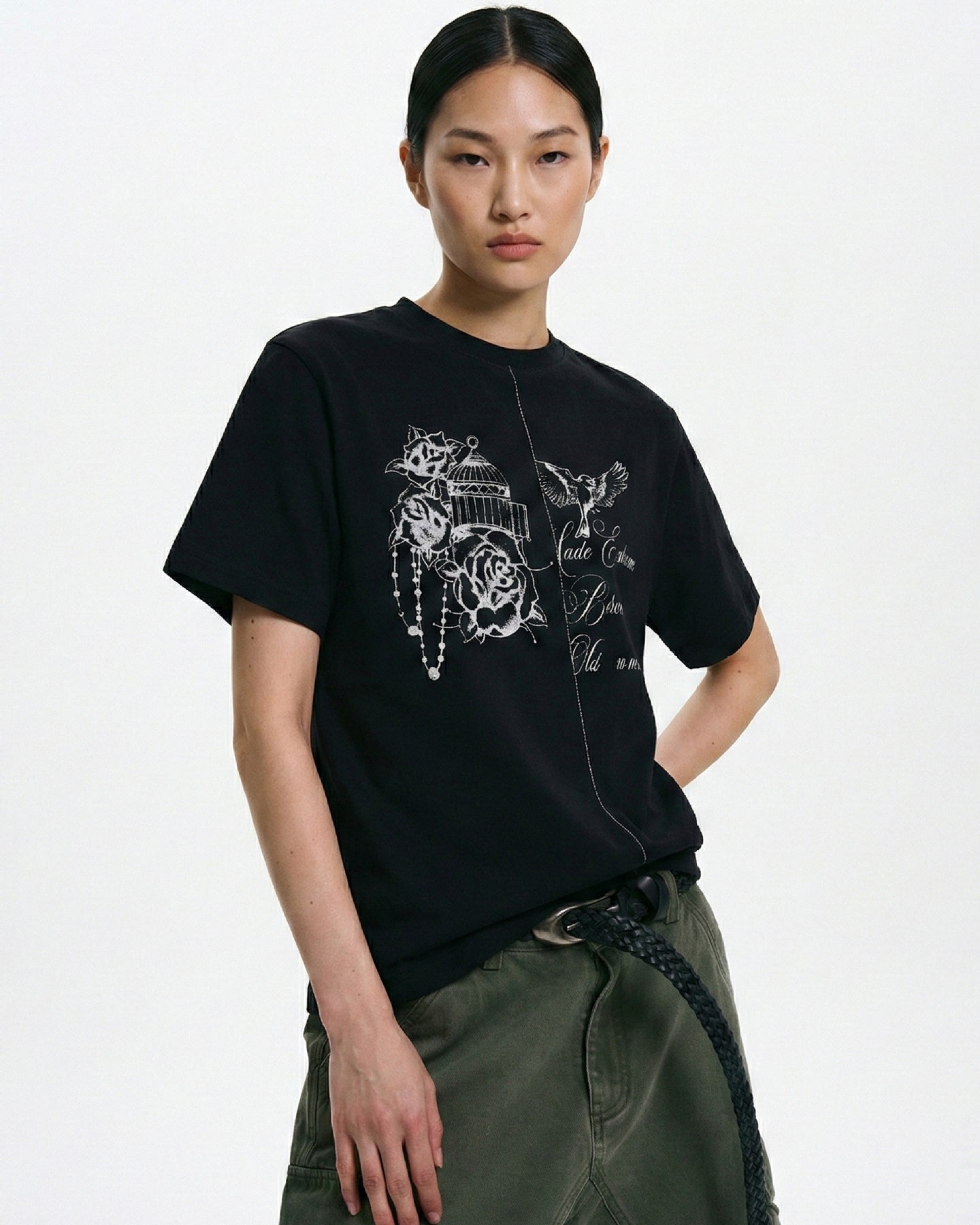 Black birdcage rose graphic T-shirt with center-front seam detail