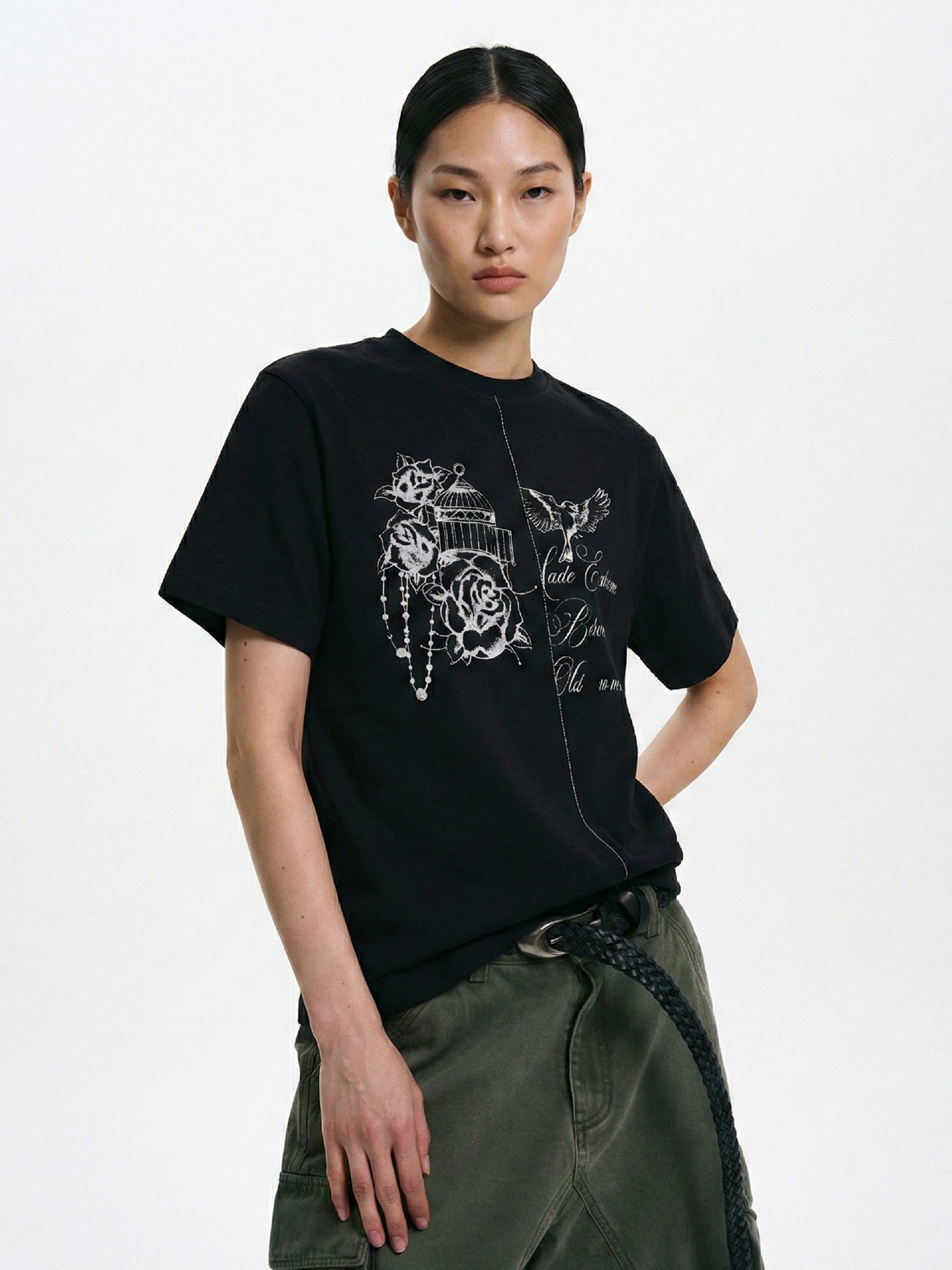 Black birdcage rose graphic T-shirt with center-front seam detail