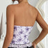Back view of lavender floral lace corset top with lace trim and strapless design.