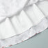 Interior lining and hem construction of white floral mini dress