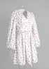 Side view of floral mini dress with zipper detail on mannequin.