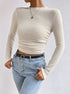 three-quarter angle, crewneck waffle knit long sleeve crop top in cream