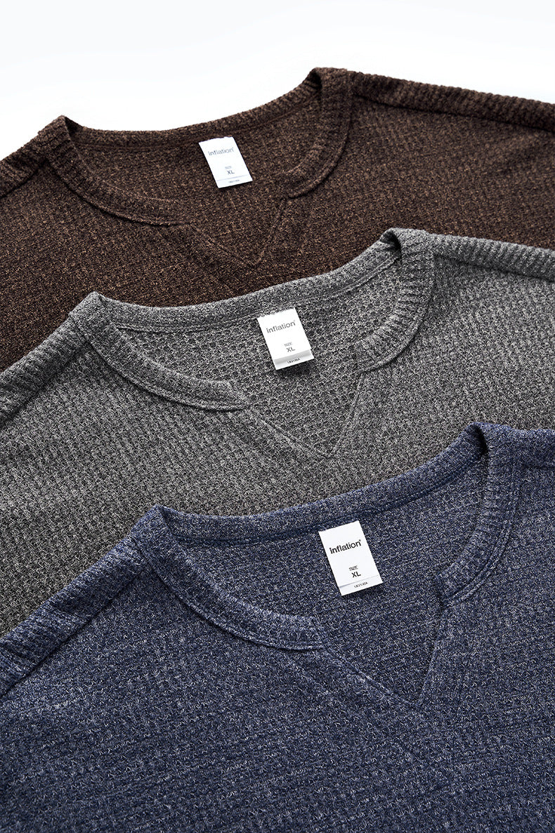 Different colors of waffle knit V-neck long sleeve t-shirts in brown, gray, navy blue