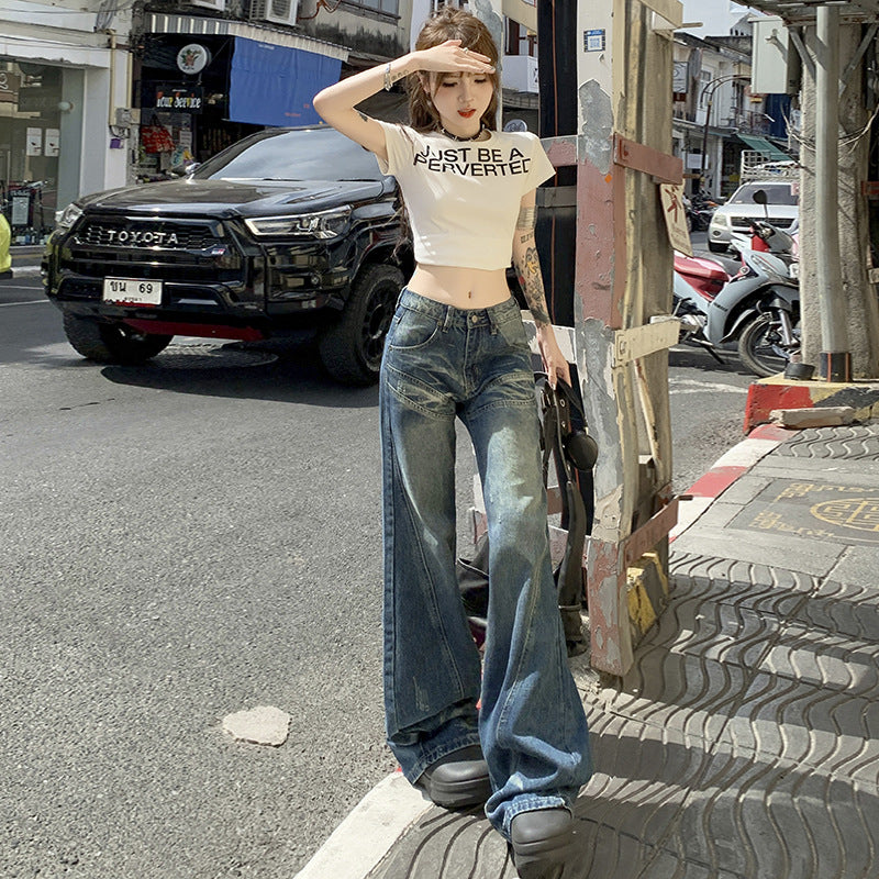 Front view of washed blue loose wide leg jeans with low waist