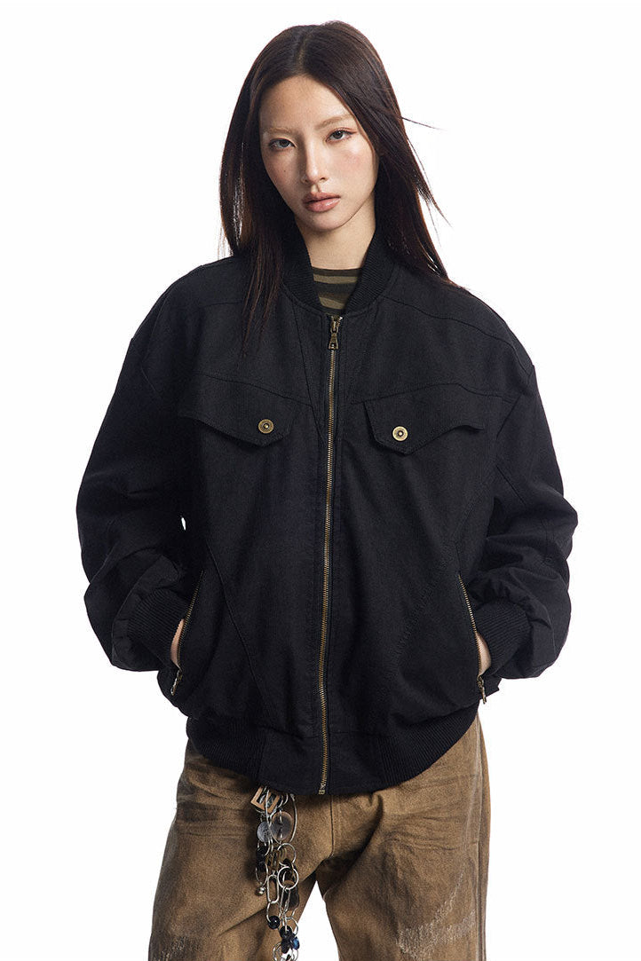 Oversized washed Harrington jacket in black with flap chest pockets and brass zipper