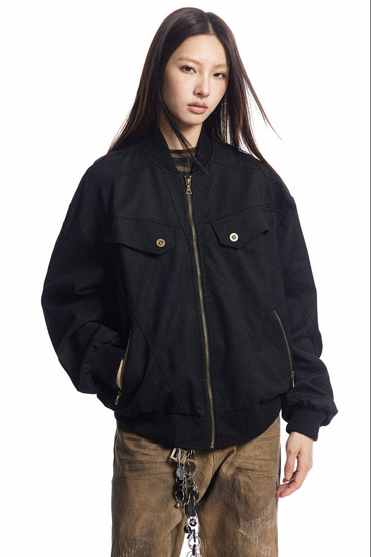 Three-quarter front view of black Harrington jacket with angled zip pockets