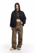 Full-length styling of black washed jacket with cropped striped top and wide pants